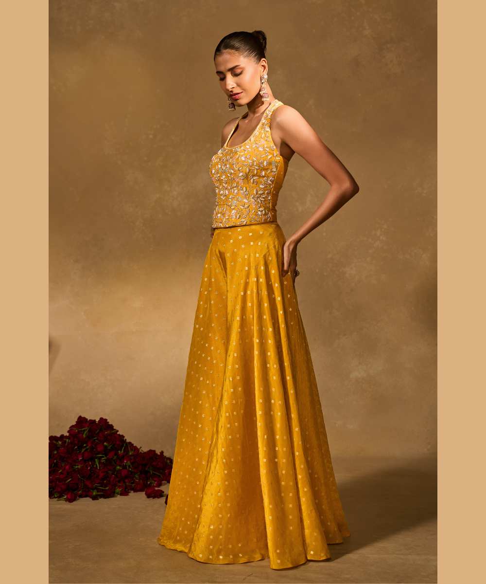 RIZ WITH TISSUE PANTS - Woven flared pant paired with a raw silk halter corset blouse -  Leher by Chamee and Palak