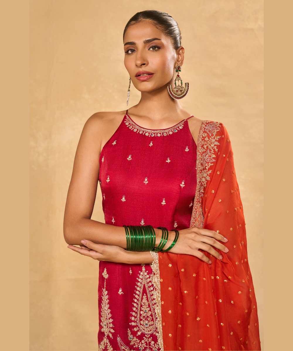 AMBI  SHARARA - Soft silk halter kurta paired with an ivory tissue Jamawar flared pant - Leher by Chamee and Palak