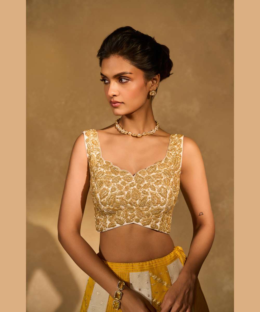 BHUMI LEHENGA - Ivory and yellow tissue jamewar lehenga with yellow organza dupatta encrusted with shimmering sequence -  Leher by Chamee and Palak