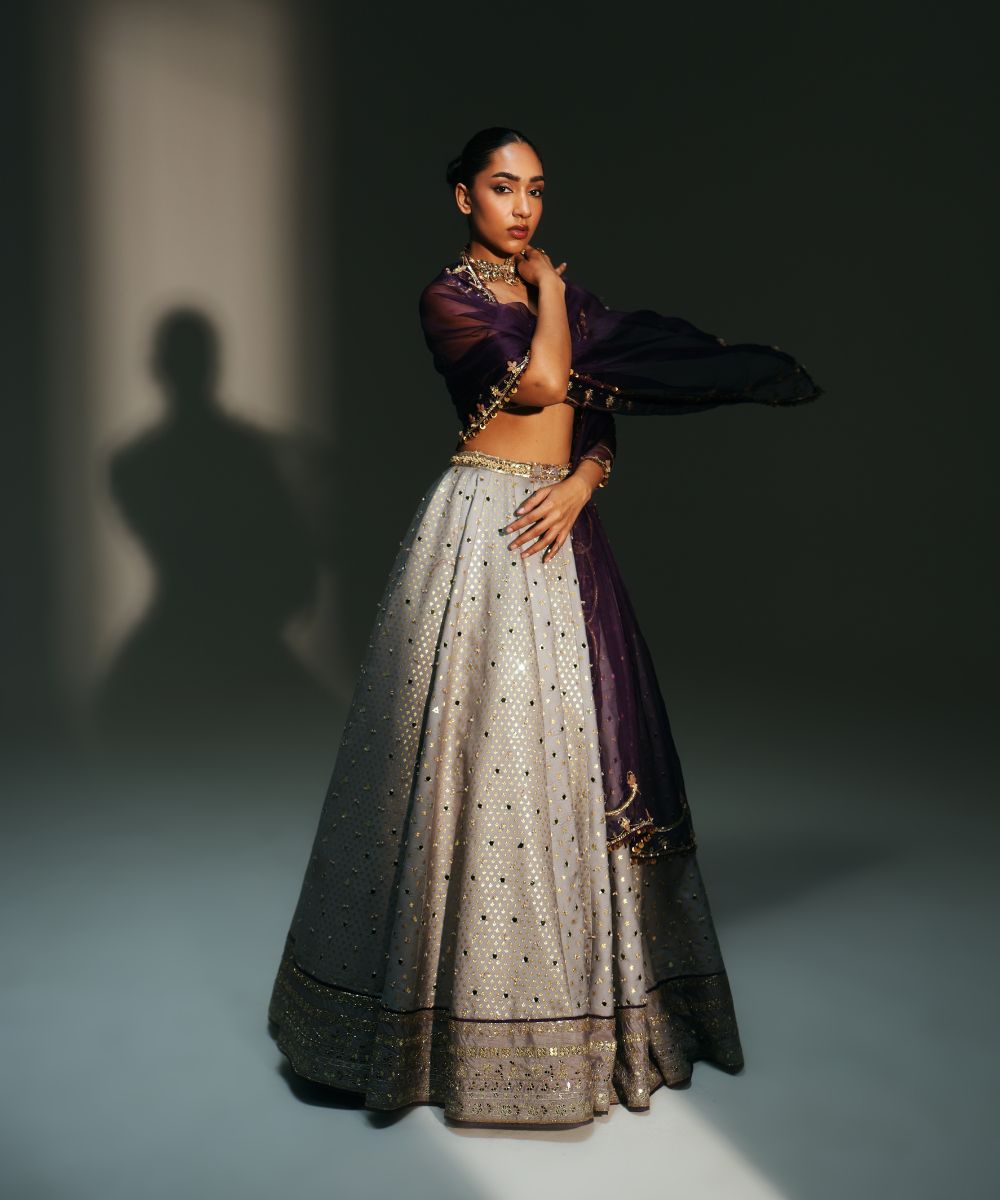 LEELA - HEAVY HAND EMBROIDERED KALI LEHENGA WITH BRALETTE WITH CRIS-CROSS DEATILING AT THE BACK AND CONTRAST DUPATTA - Mehfil by Mahima Mahajan