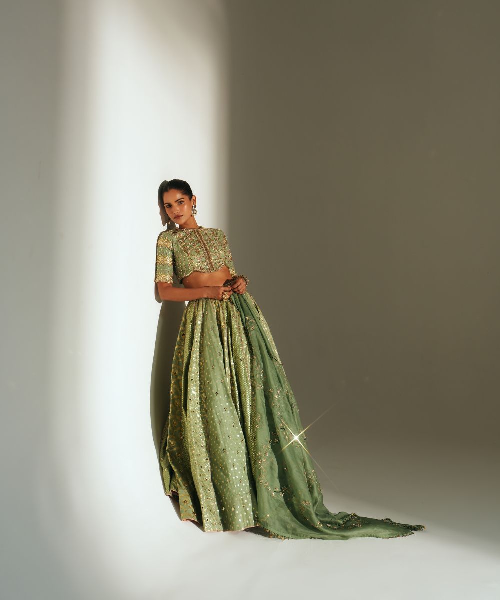 JIYA - HEAVY HAND EMBROIDERED PISTA GREEN KALI LEHENGA - Mehfil by Mahima Mahajan