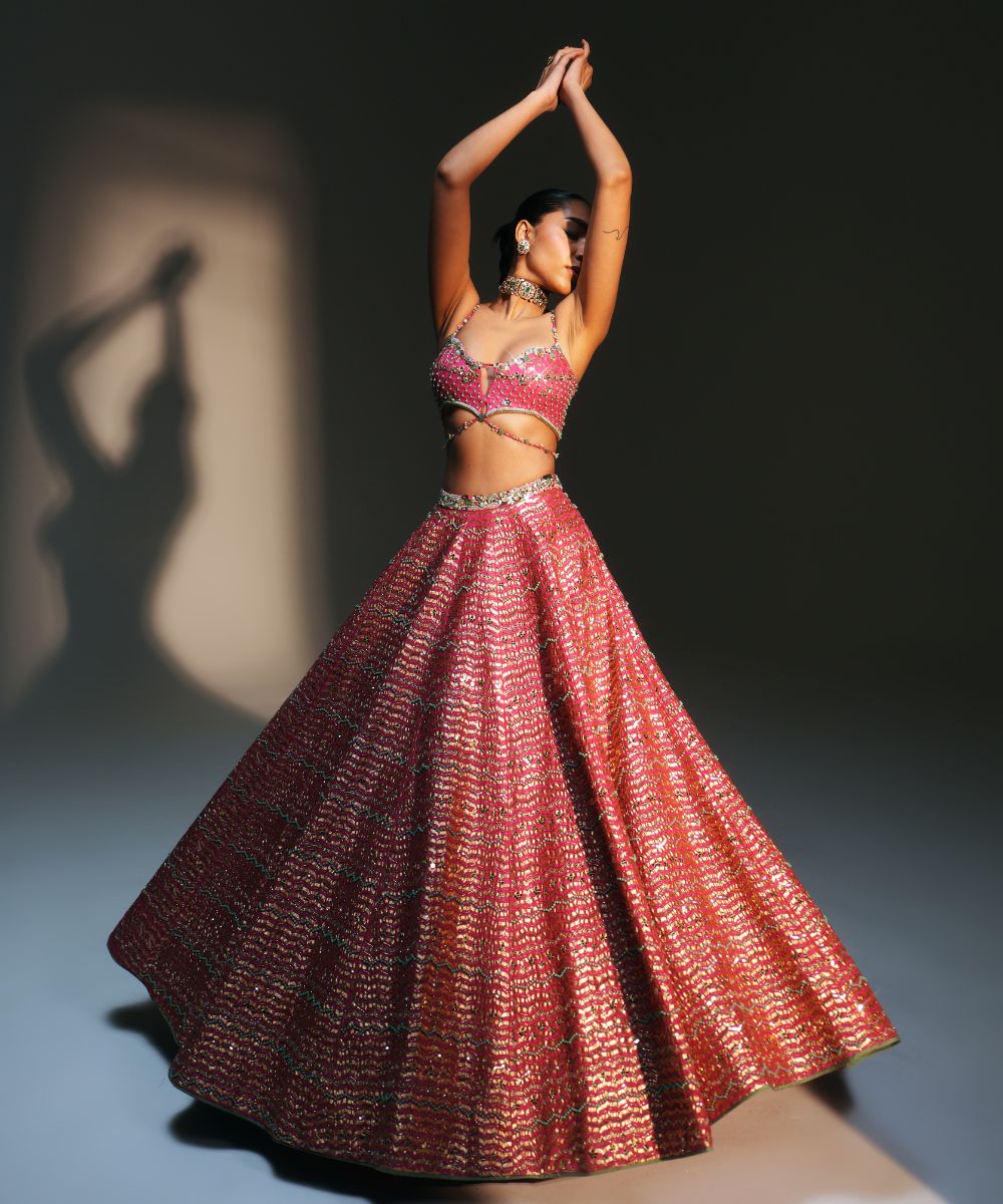 KOMAL- HEAVY HAND EMBROIDERED RANI PINK KALI LEHENGA - Mehfil by Mahima Mahajan
