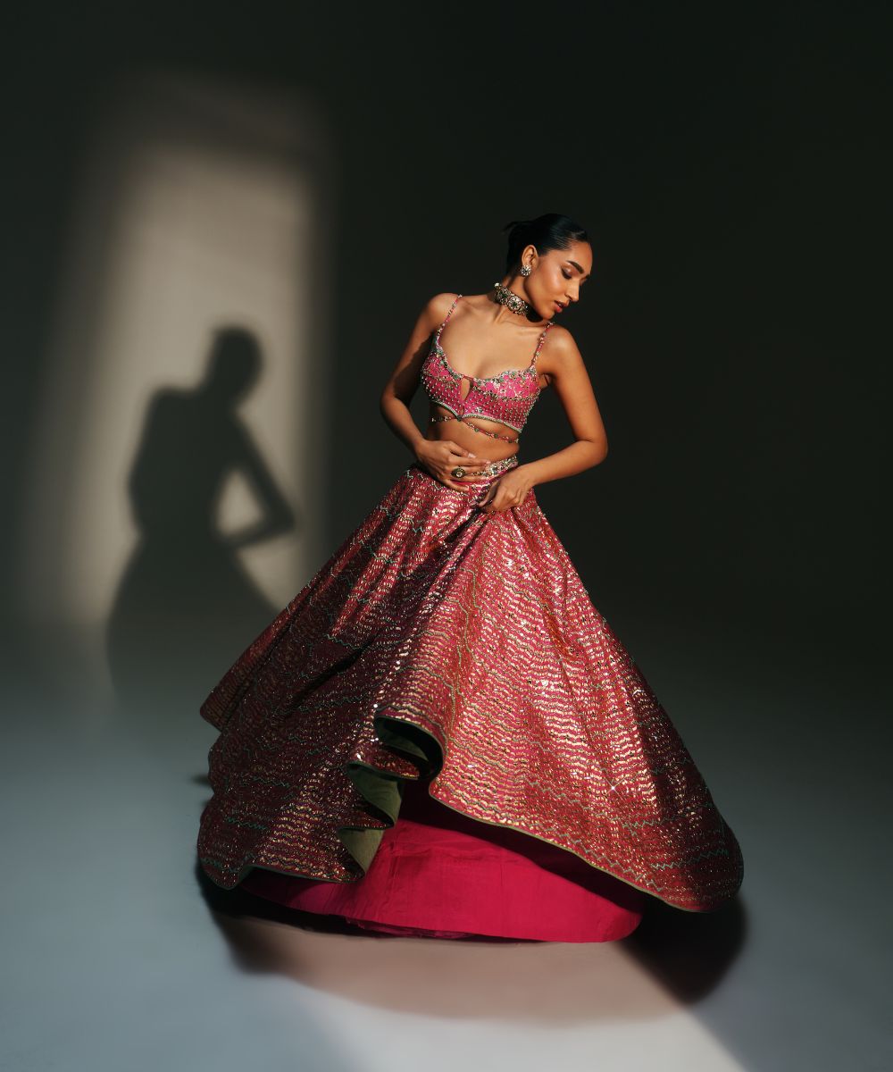 KOMAL- HEAVY HAND EMBROIDERED RANI PINK KALI LEHENGA - Mehfil by Mahima Mahajan