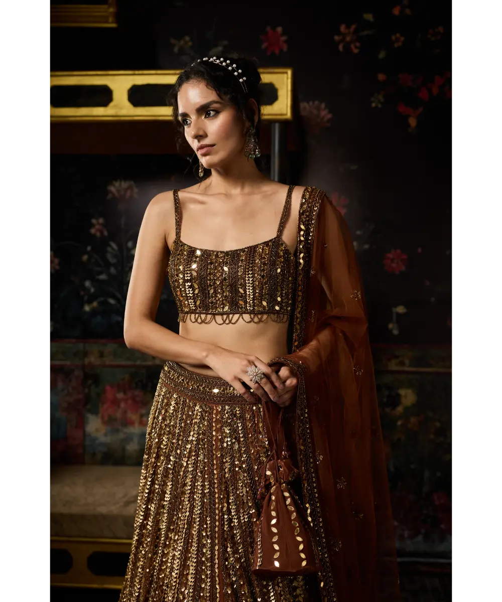DIYARAJVVIR - METALLIC GOLD EMBELLISHED MIRRORWORK LEHENGA SET