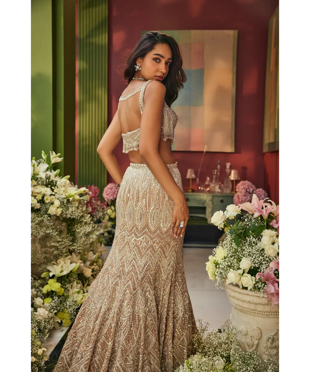 ISA BY DOLLY WAHAL - Rose Gold & Silver Net Sequins & Cutdana Embroidery Fish Cut Lehenga Set