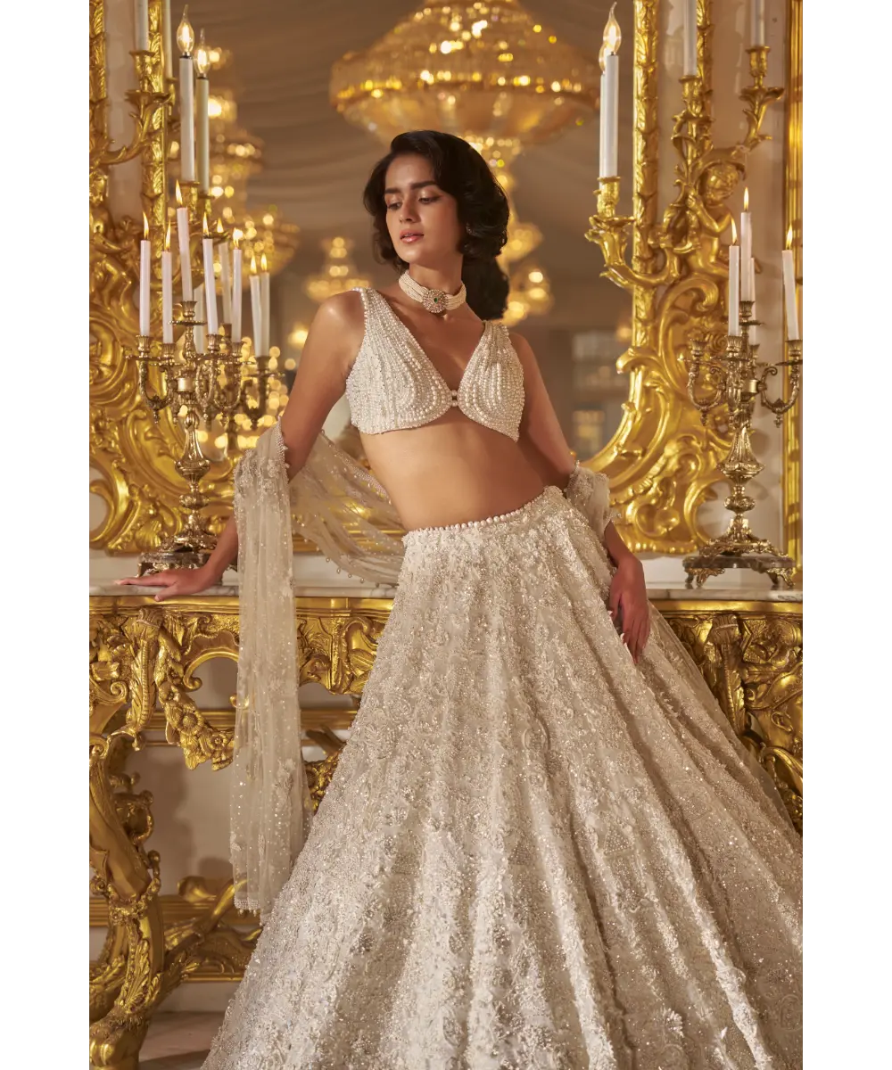 SEEMA GUJRAL- Ivory Three-Dimensional Lehenga Set