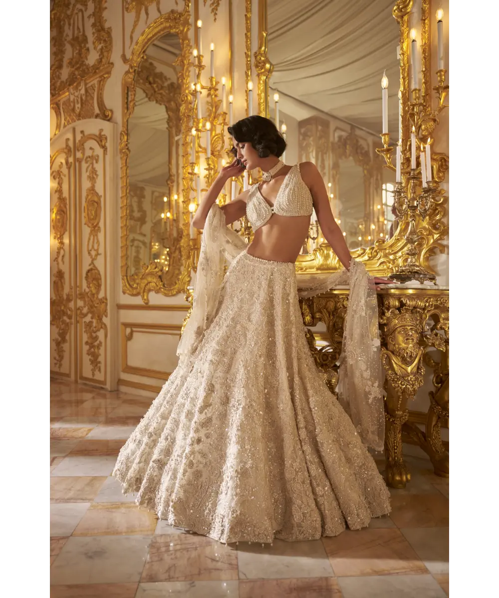 SEEMA GUJRAL- Ivory Three-Dimensional Lehenga Set