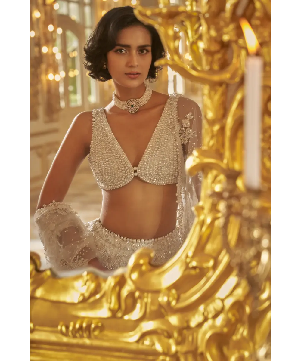 SEEMA GUJRAL- Ivory Three-Dimensional Lehenga Set