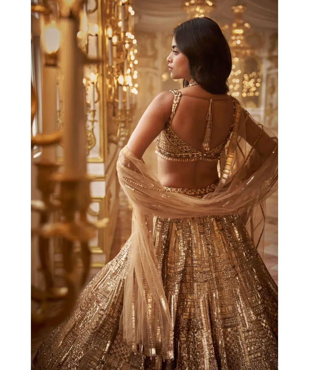 SEEMA GUJRAL- Antique Gold Lehenga Set