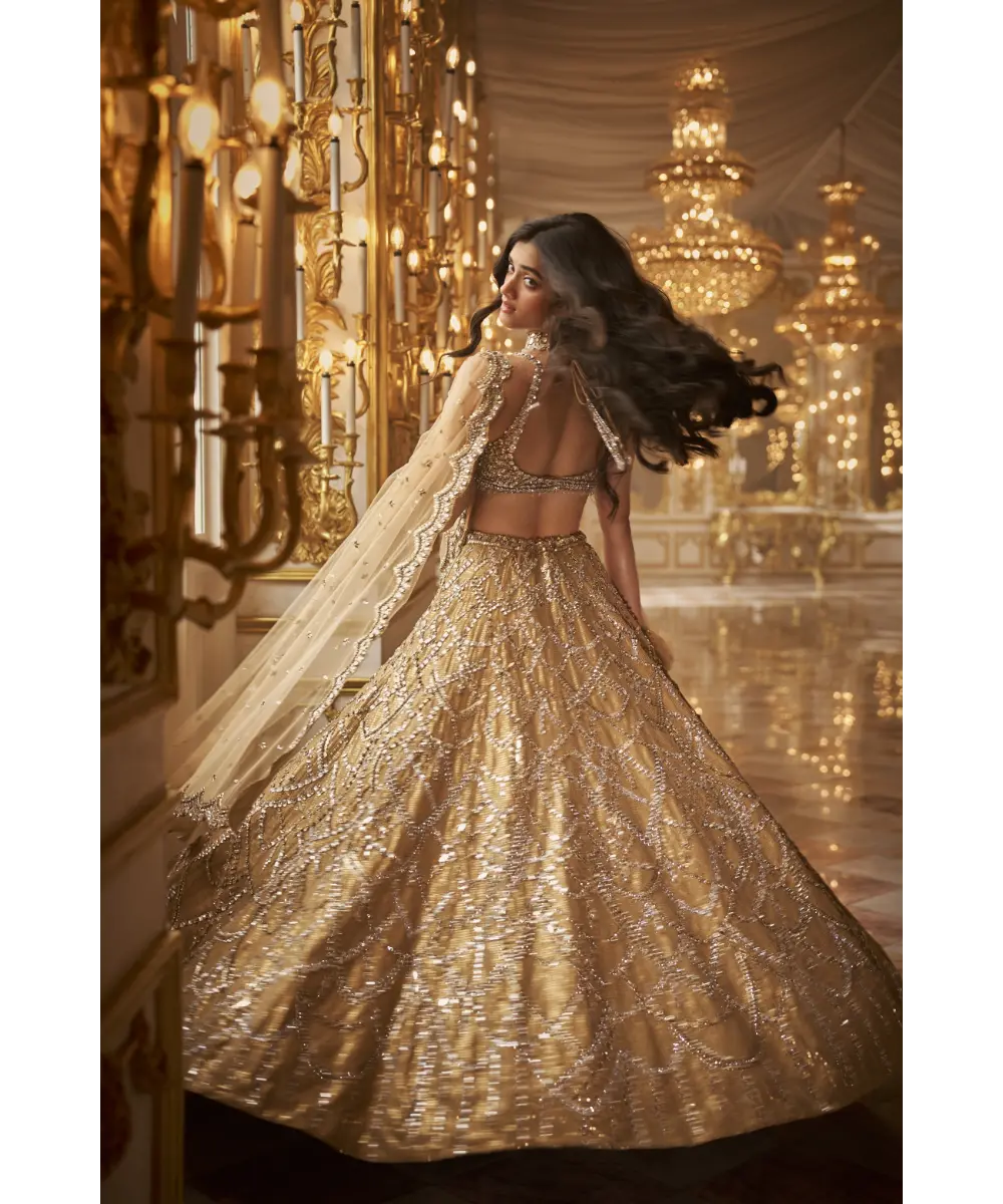SEEMA GUJRAL- Gold Chandelier Lehenga Set