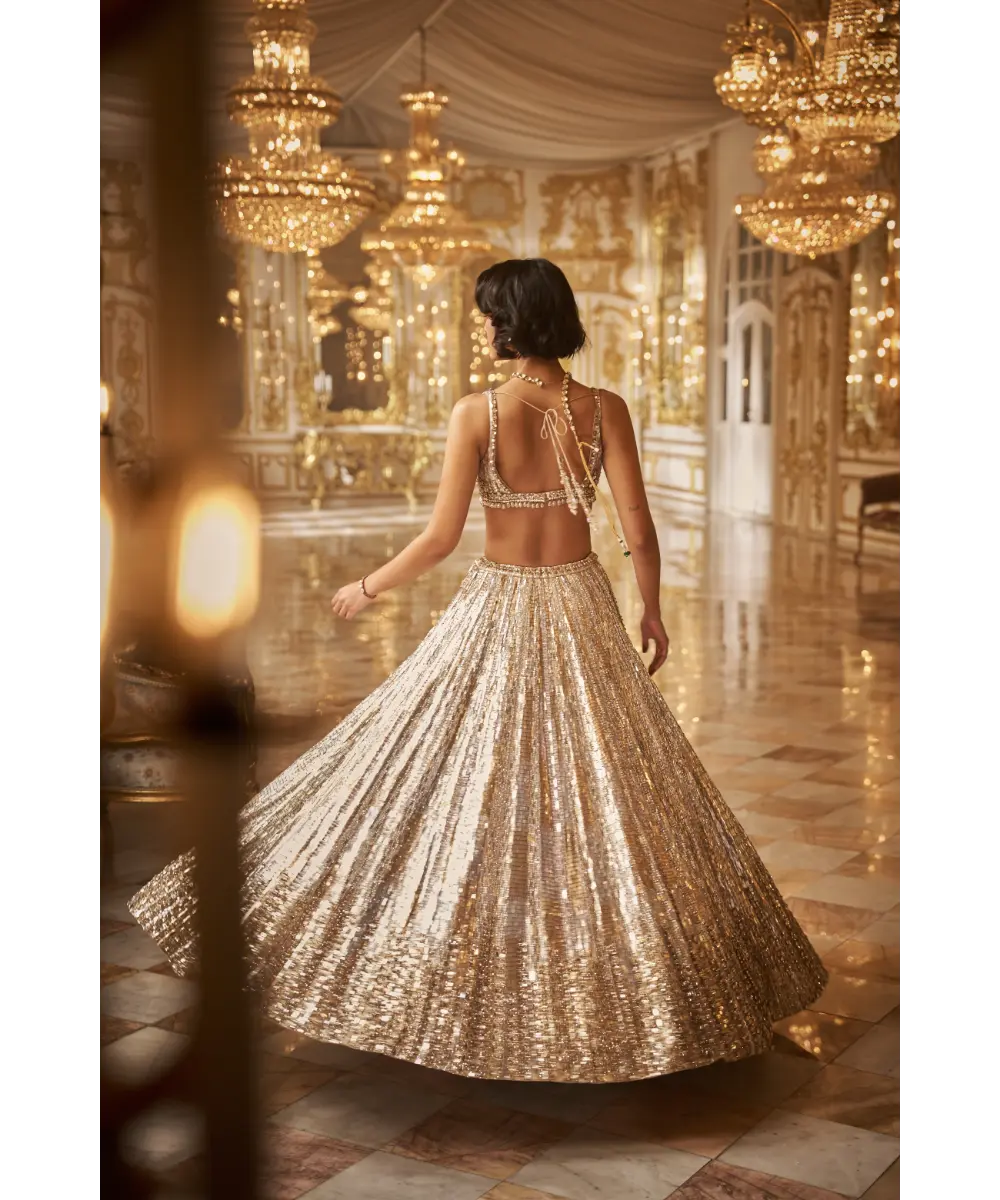 SEEMA GUJRAL- Silver Gold Crystal Lehenga Set