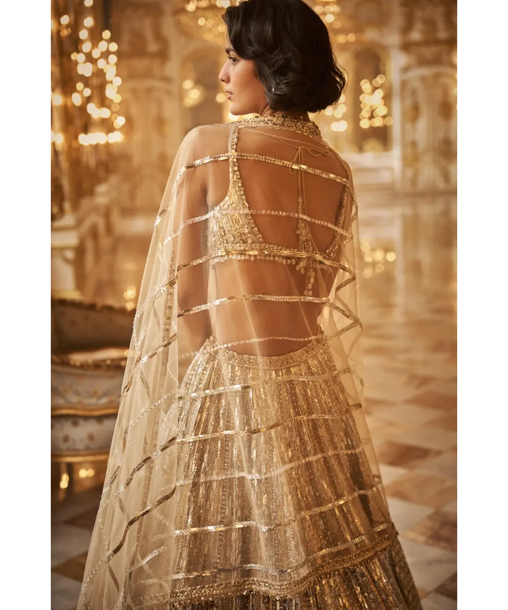 SEEMA GUJRAL- Silver Gold Crystal Lehenga Set