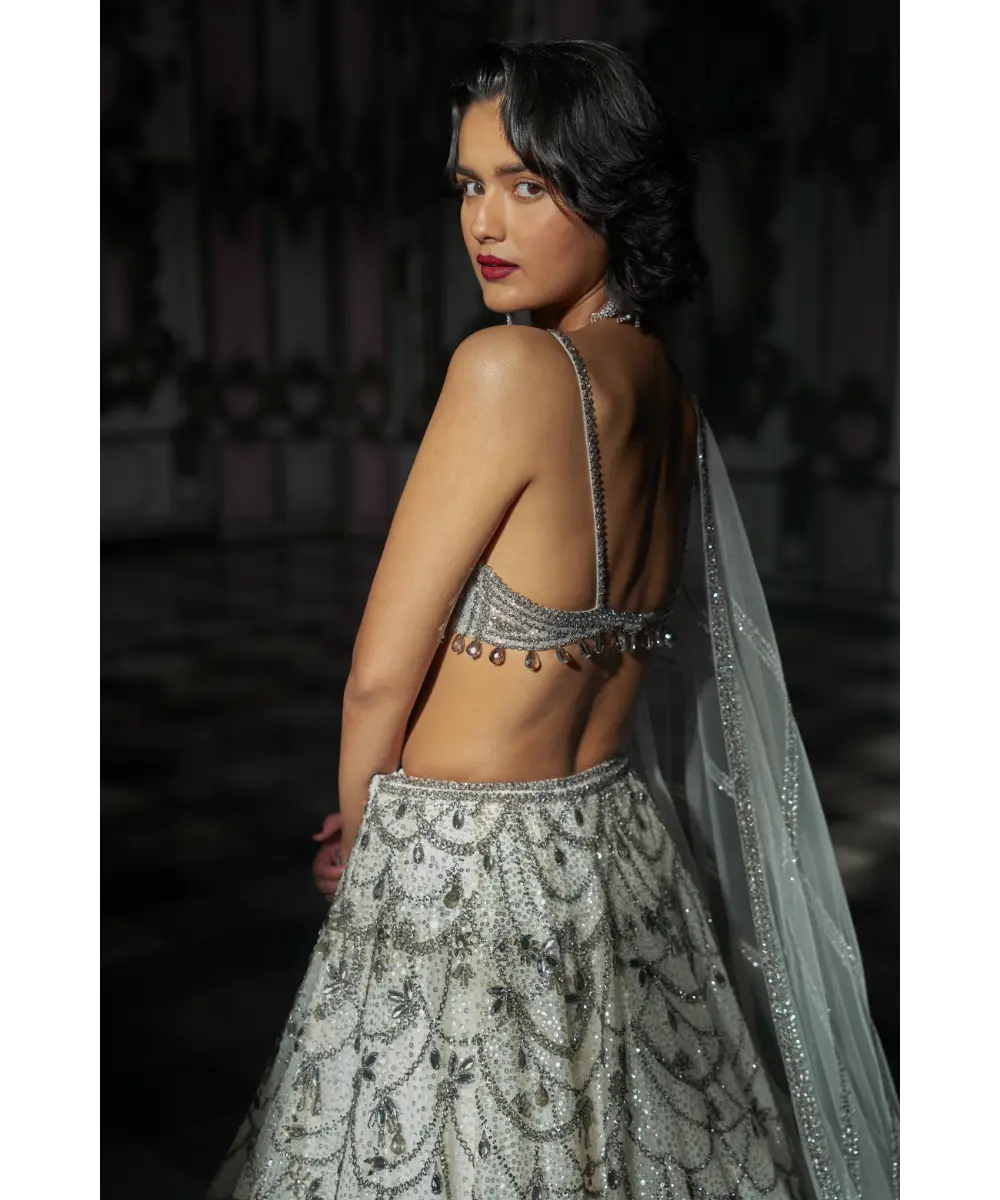 SEEMA GUJRAL- White Chandelier Lehnega Set