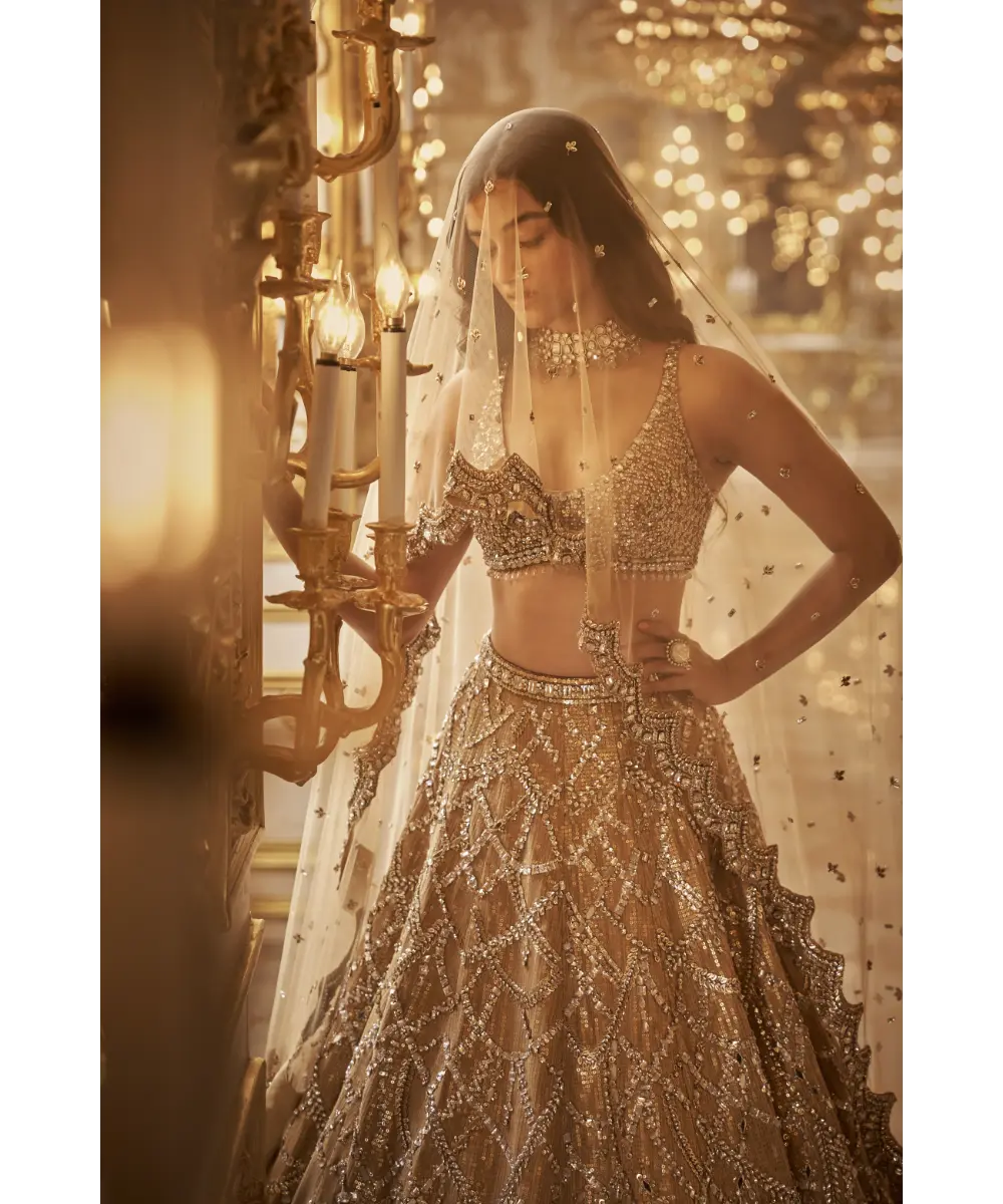 SEEMA GUJRAL- Gold Chandelier Lehenga Set