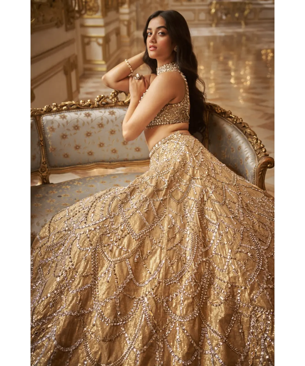 SEEMA GUJRAL- Gold Chandelier Lehenga Set