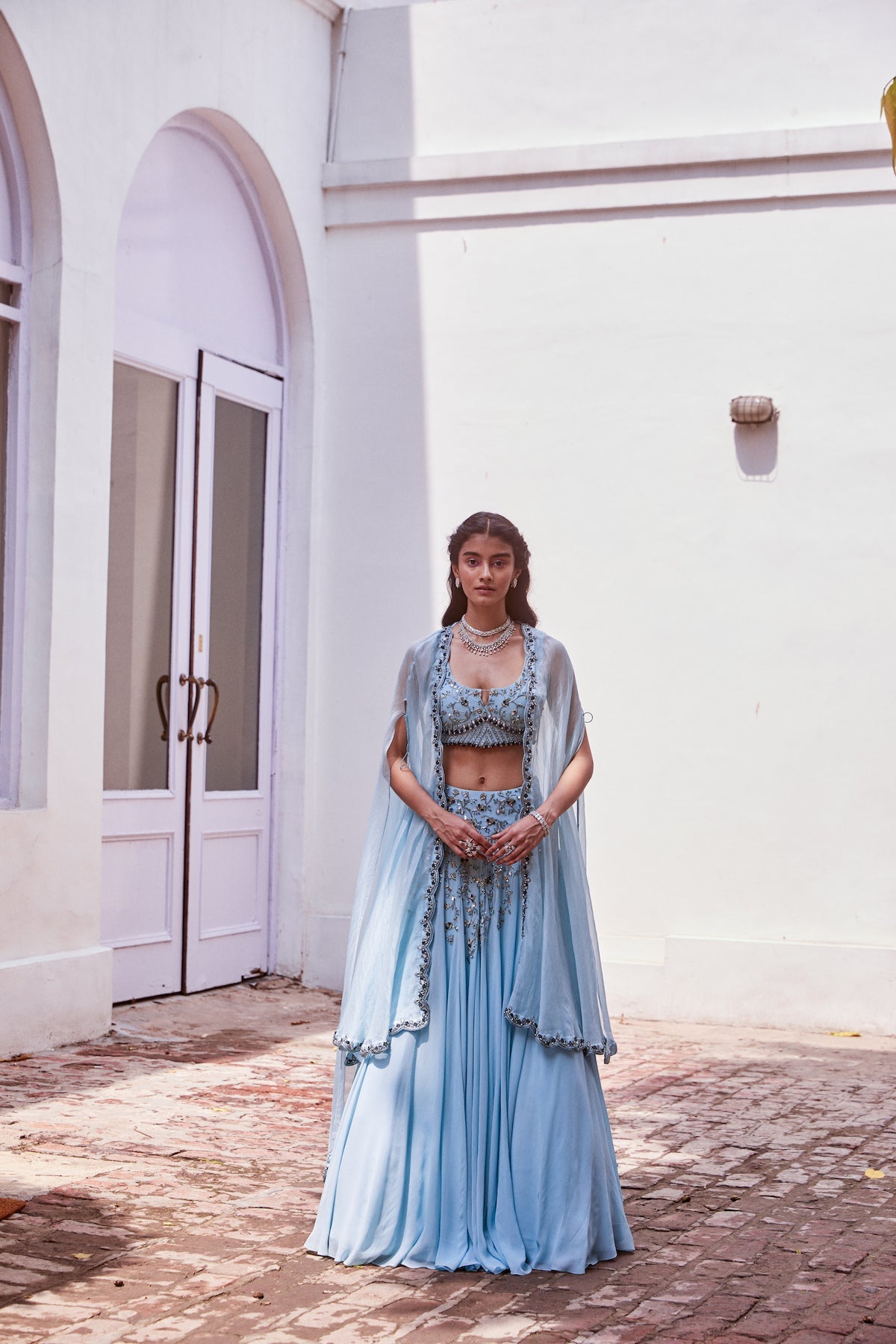 Sanya Gulati - Ice blue Embroidered Lehenga Blouse with Cape Set from Fizah