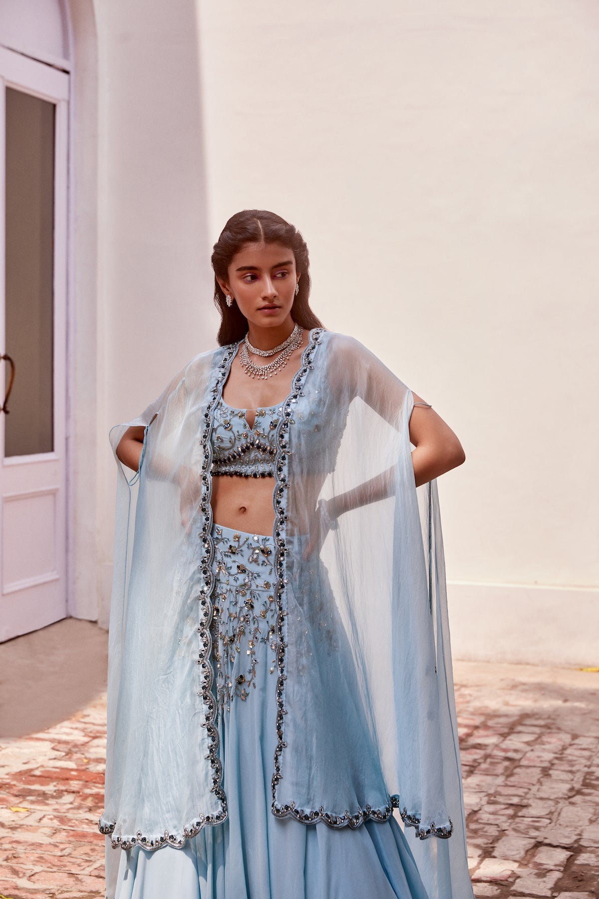Sanya Gulati - Ice blue Embroidered Lehenga Blouse with Cape Set from Fizah