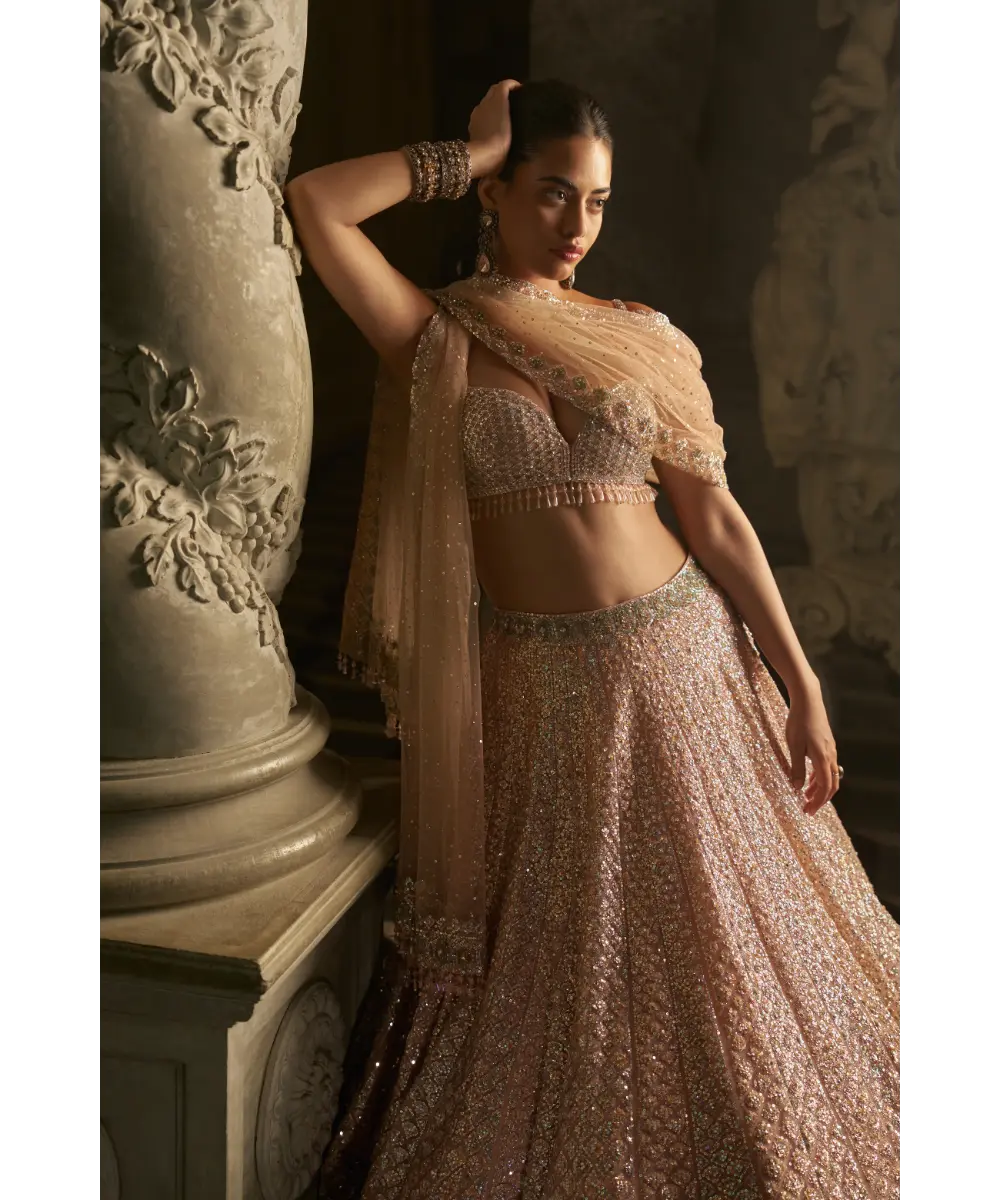 SEEMA GUJRAL- Powder Peach Sequin Lehenga Set