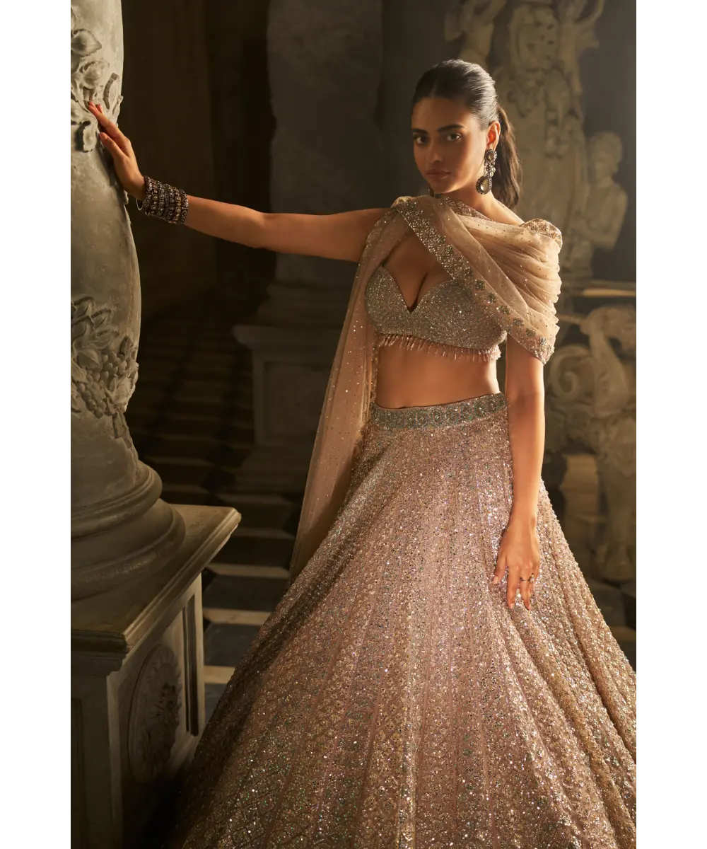 SEEMA GUJRAL- Powder Peach Sequin Lehenga Set