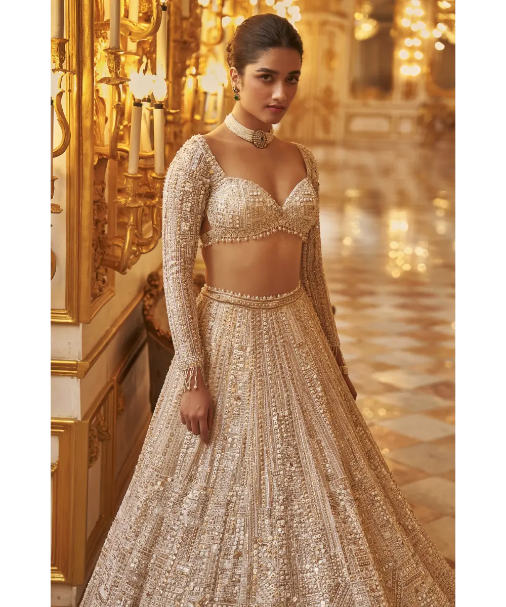 SEEMA GUJRAL- Ivory Gold Sequin Lehenga Set