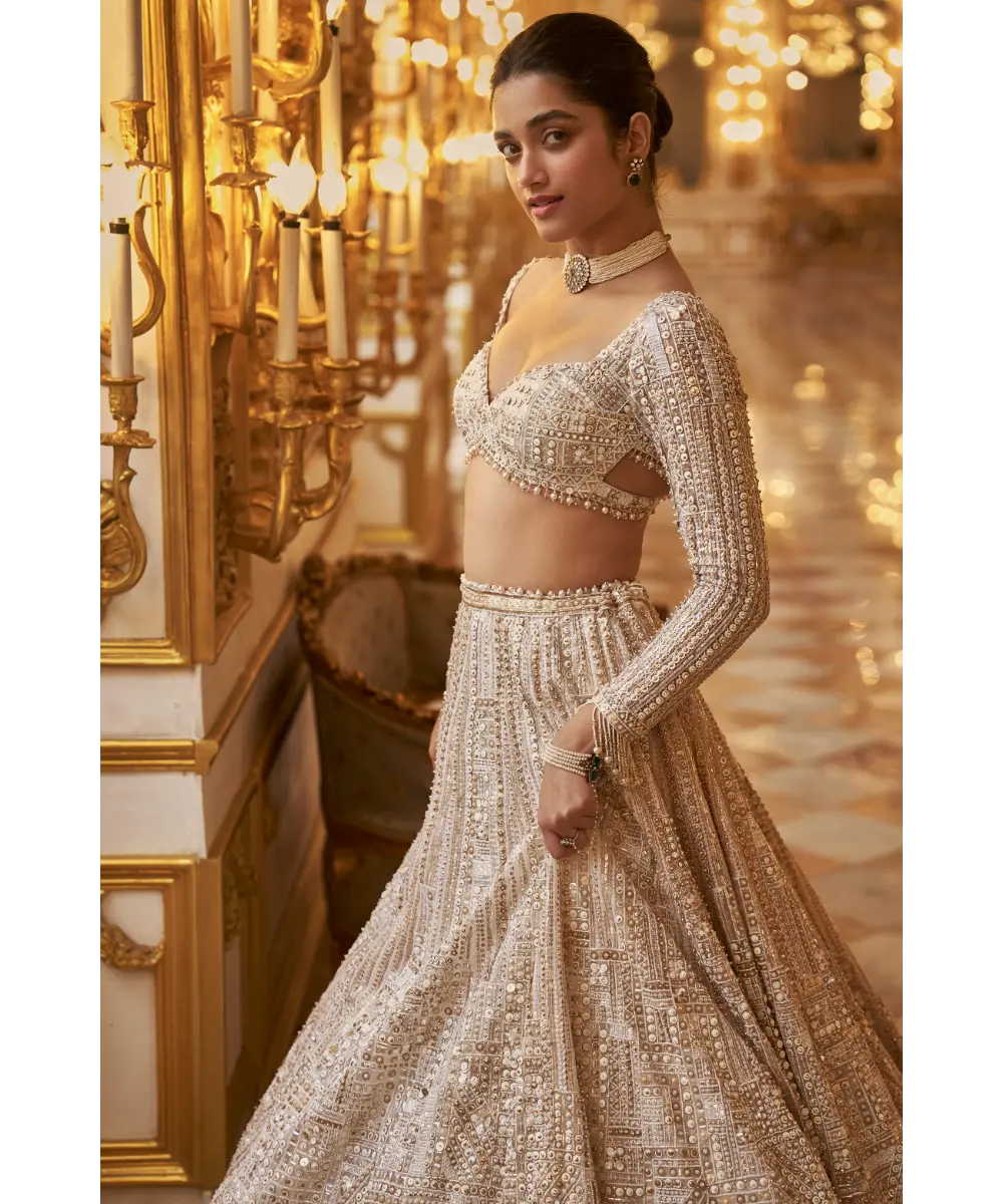 SEEMA GUJRAL- Ivory Gold Sequin Lehenga Set