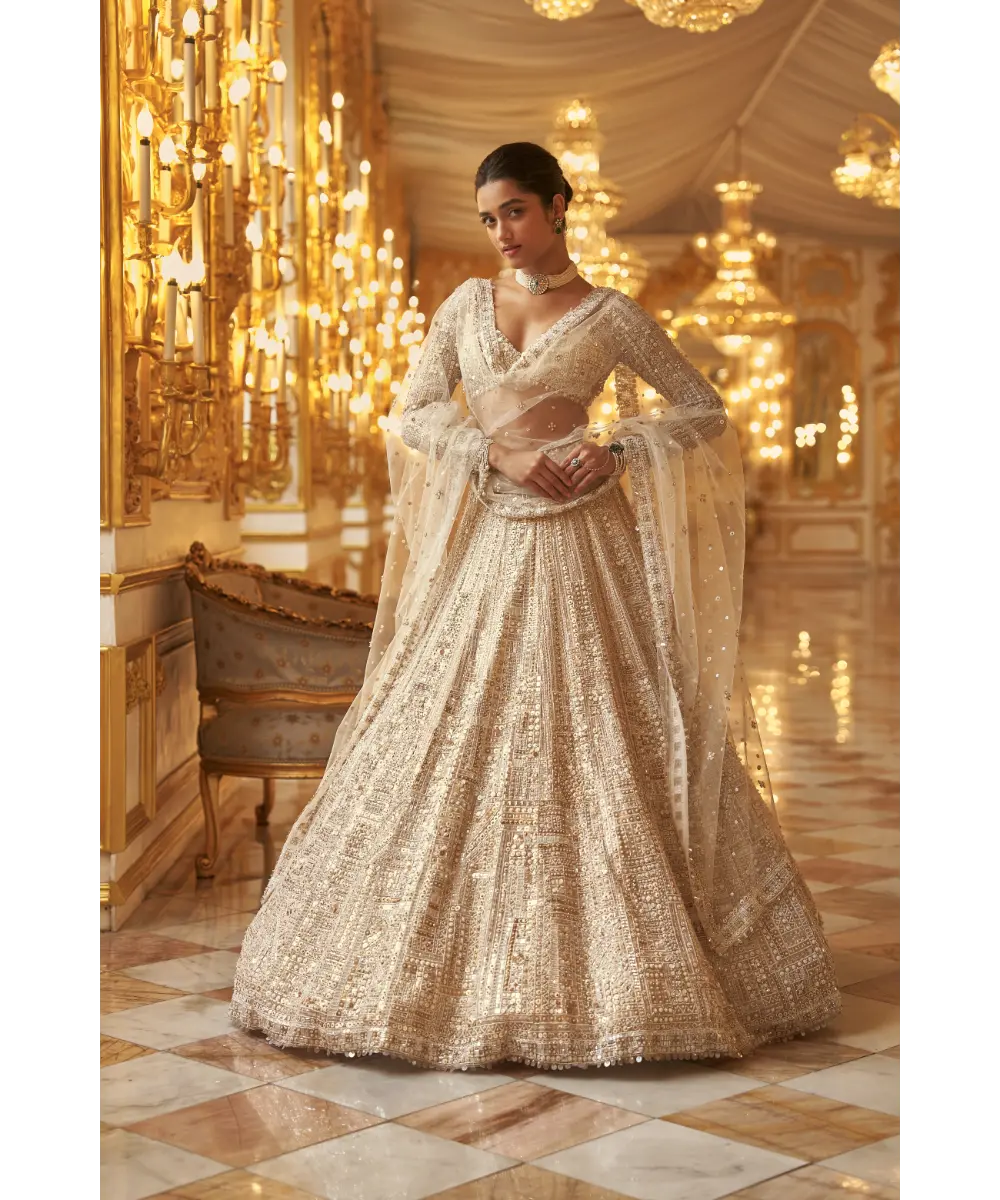 SEEMA GUJRAL- Ivory Gold Sequin Lehenga Set