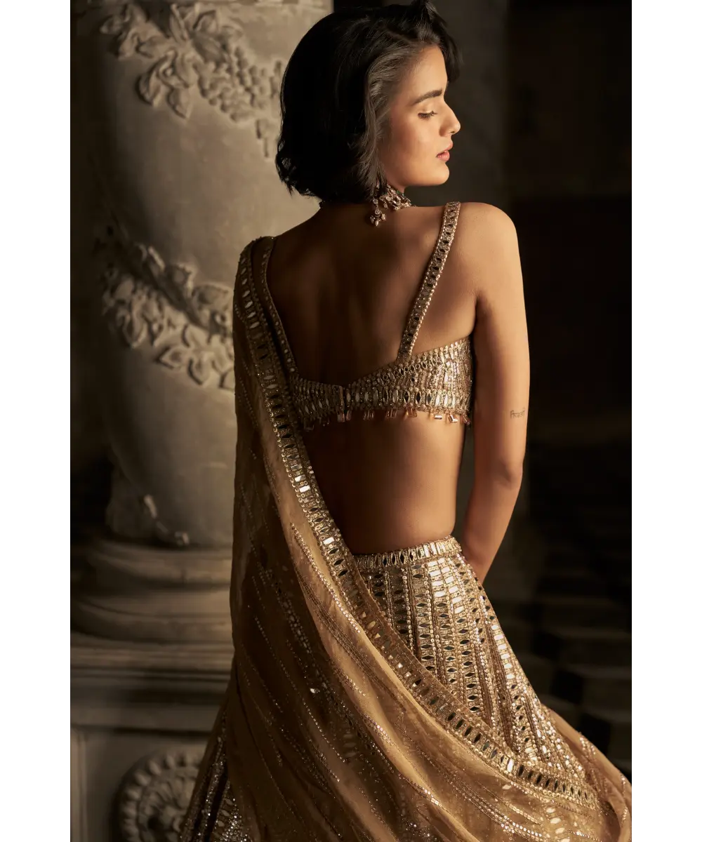 SEEMA GUJRAL-  Gold Mirror Work Lehenga Set