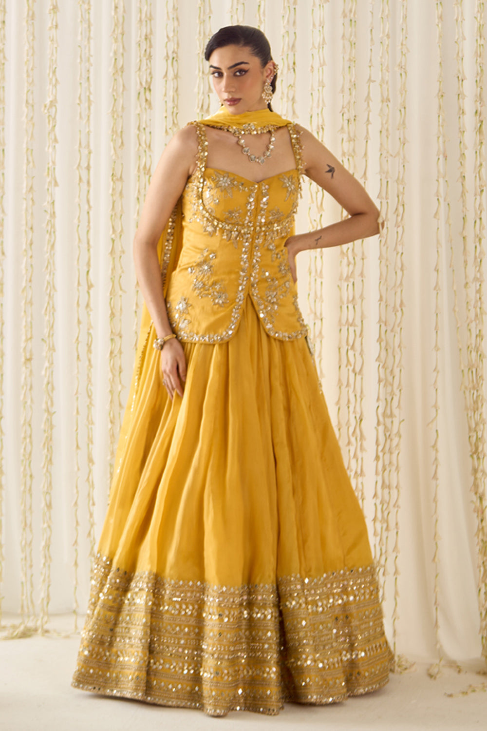 Sanya Gulati - Mustard Peplum and Lehenga Set from Jawaani Janeman