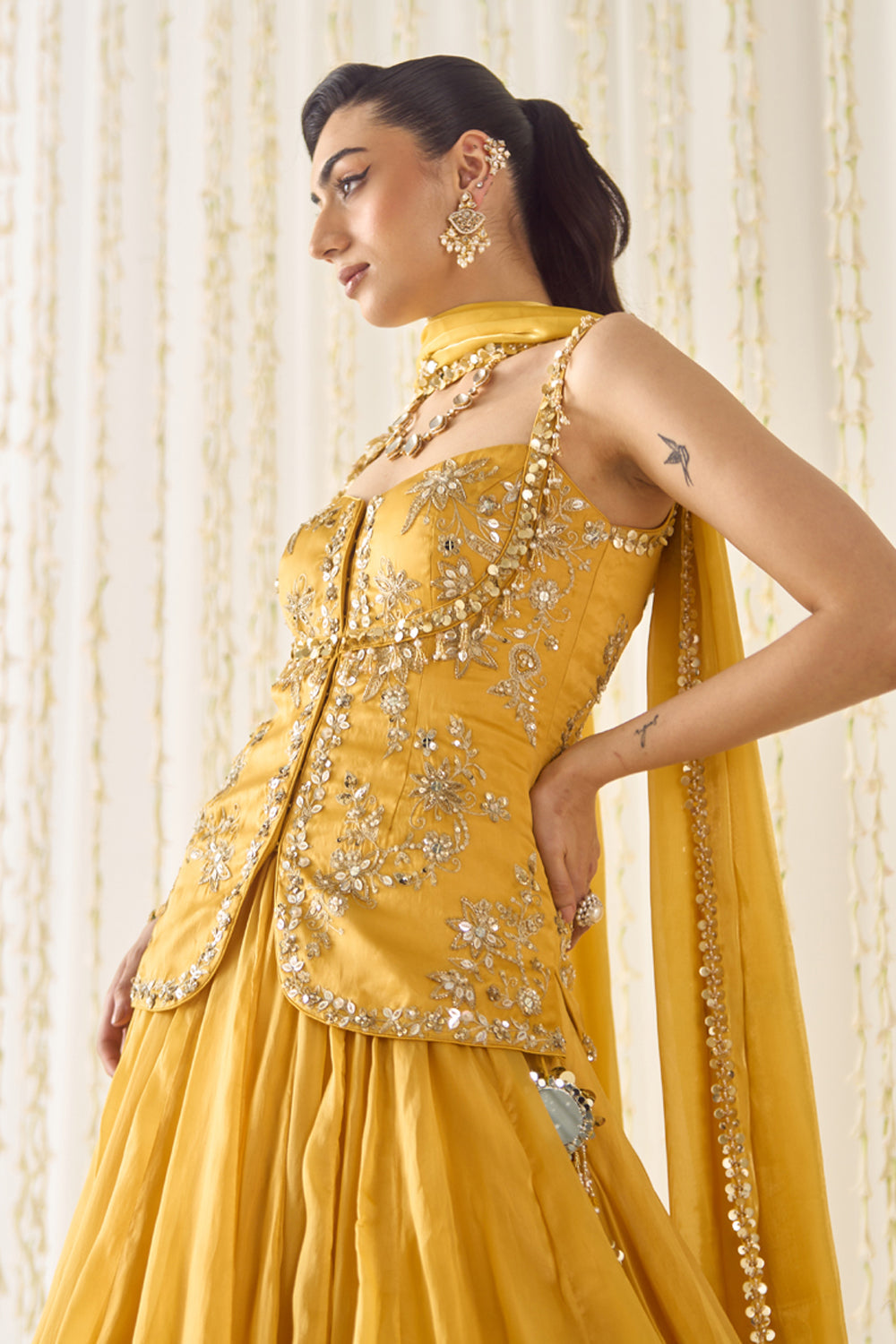 Sanya Gulati - Mustard Peplum and Lehenga Set from Jawaani Janeman