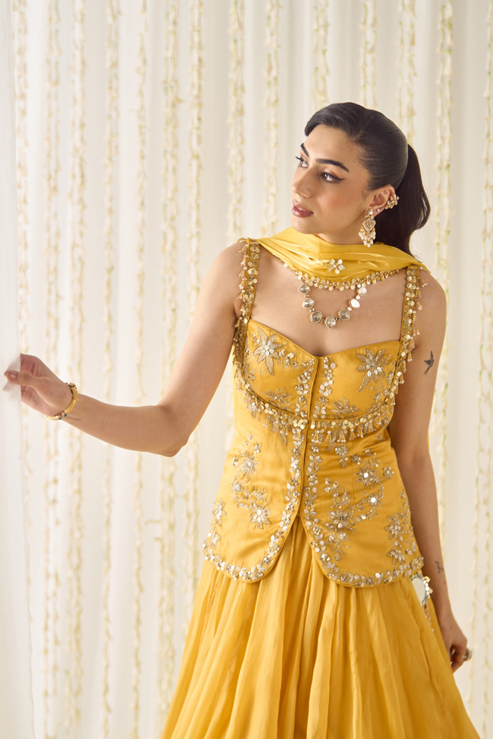Sanya Gulati - Mustard Peplum and Lehenga Set from Jawaani Janeman