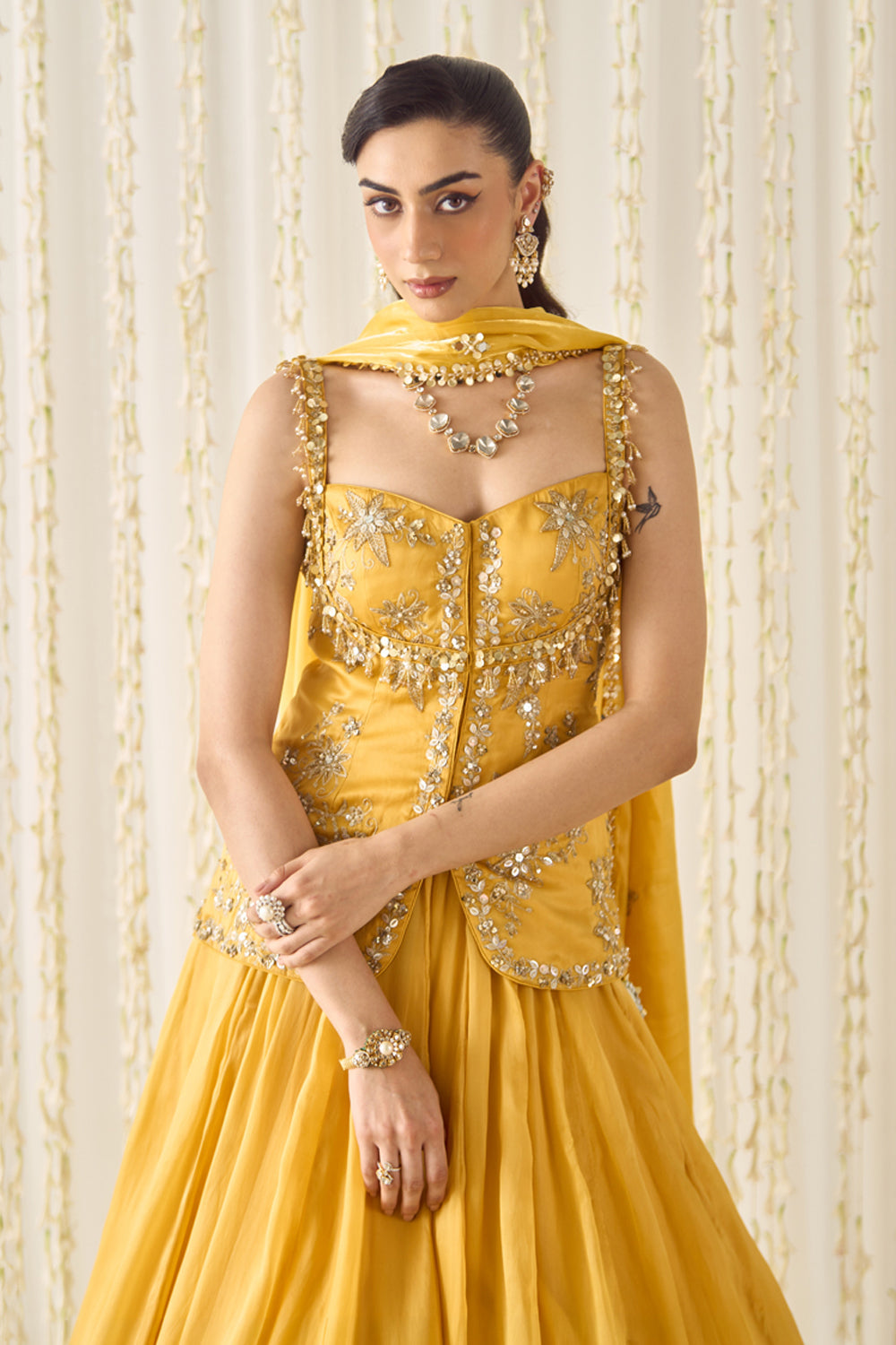 Sanya Gulati - Mustard Peplum and Lehenga Set from Jawaani Janeman