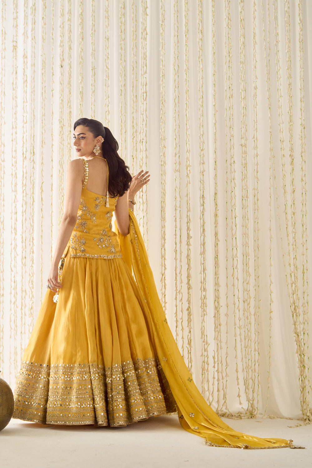 Sanya Gulati - Mustard Peplum and Lehenga Set from Jawaani Janeman