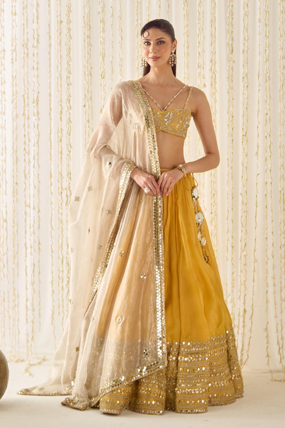 Sanya Gulati - Mustard Bustier and Lehenga Set from Jawaani Janeman
