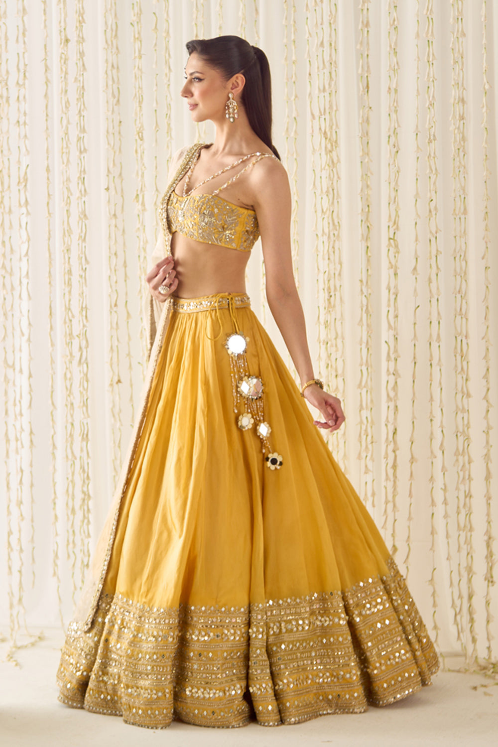 Sanya Gulati - Mustard Bustier and Lehenga Set from Jawaani Janeman