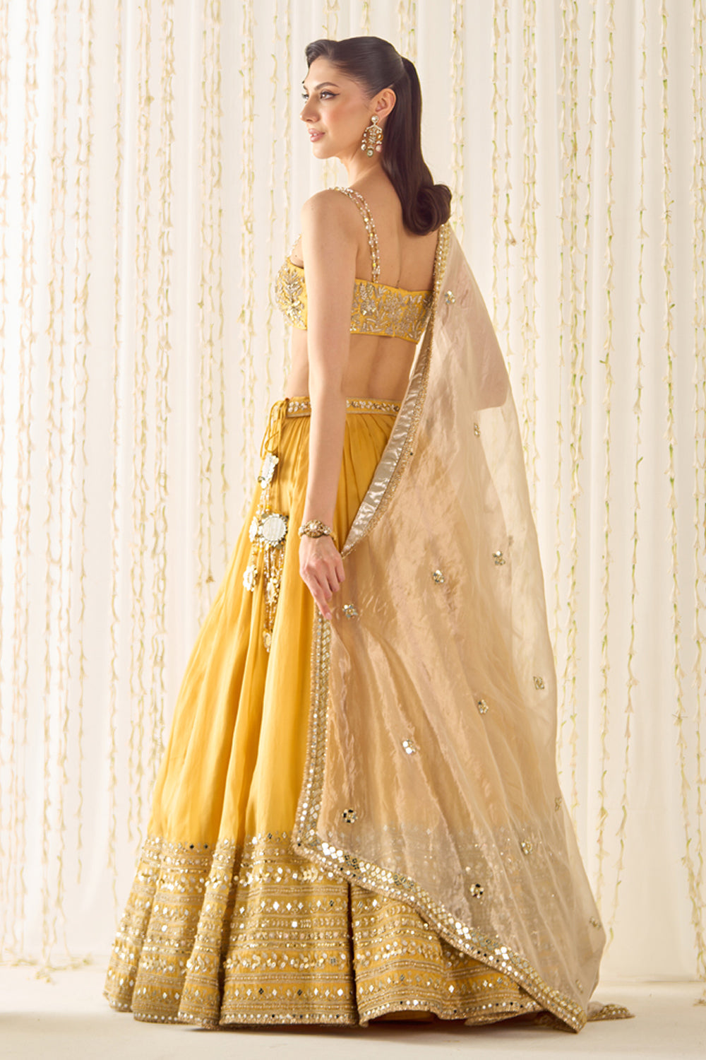 Sanya Gulati - Mustard Bustier and Lehenga Set from Jawaani Janeman