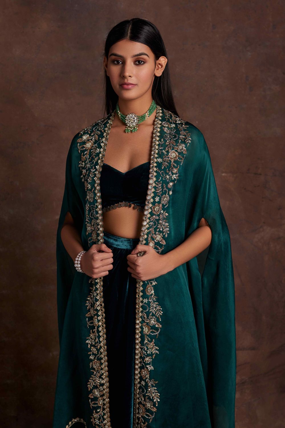 Sanya Gulati - Green Velvet Drape Skirt Bustier and Organza Cape Set from Mahtab