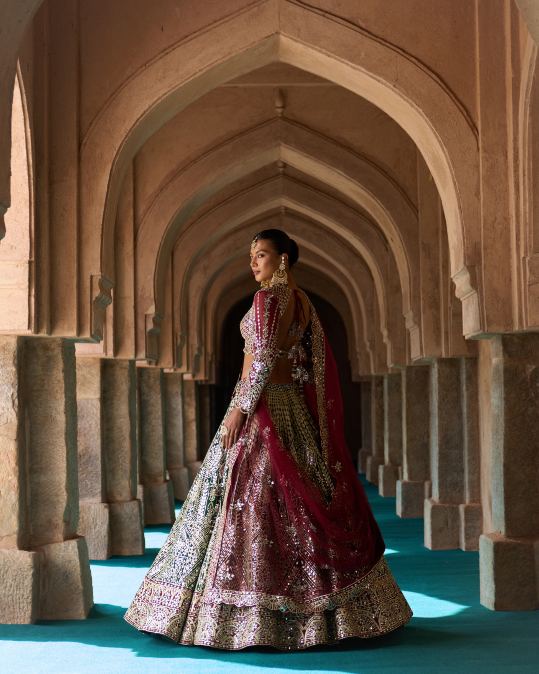 Angad Singh - SUKOON — Bottle Green Raw Silk Lehenga Set with Contrast Blouse From Zariya