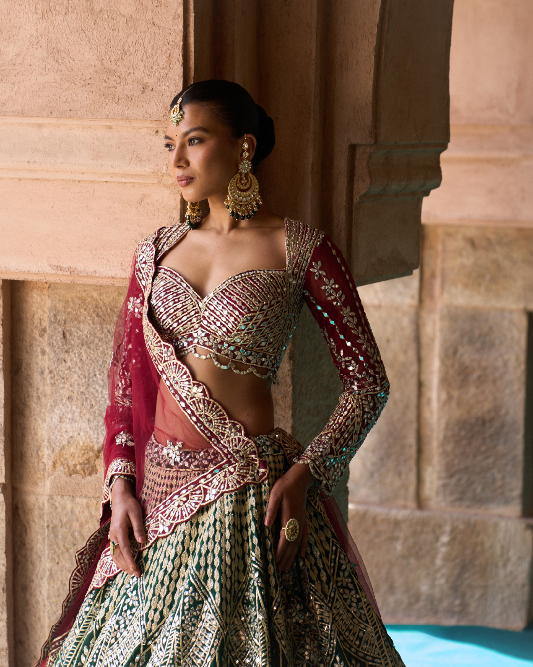 Angad Singh - SUKOON — Bottle Green Raw Silk Lehenga Set with Contrast Blouse From Zariya