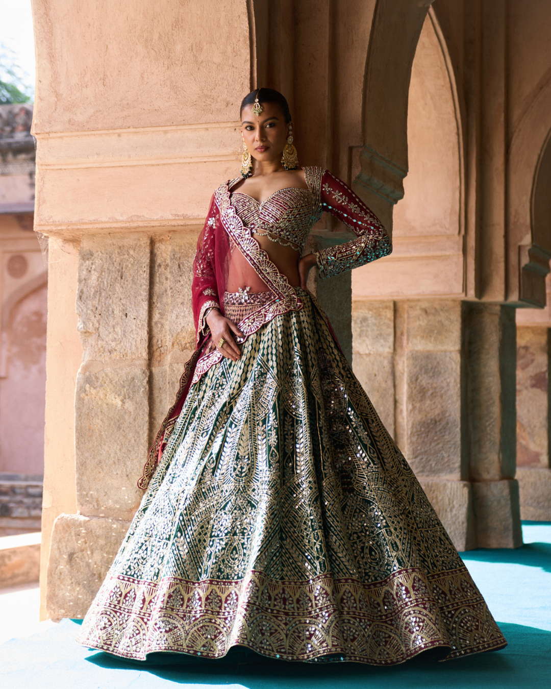 Angad Singh - SUKOON — Bottle Green Raw Silk Lehenga Set with Contrast Blouse From Zariya