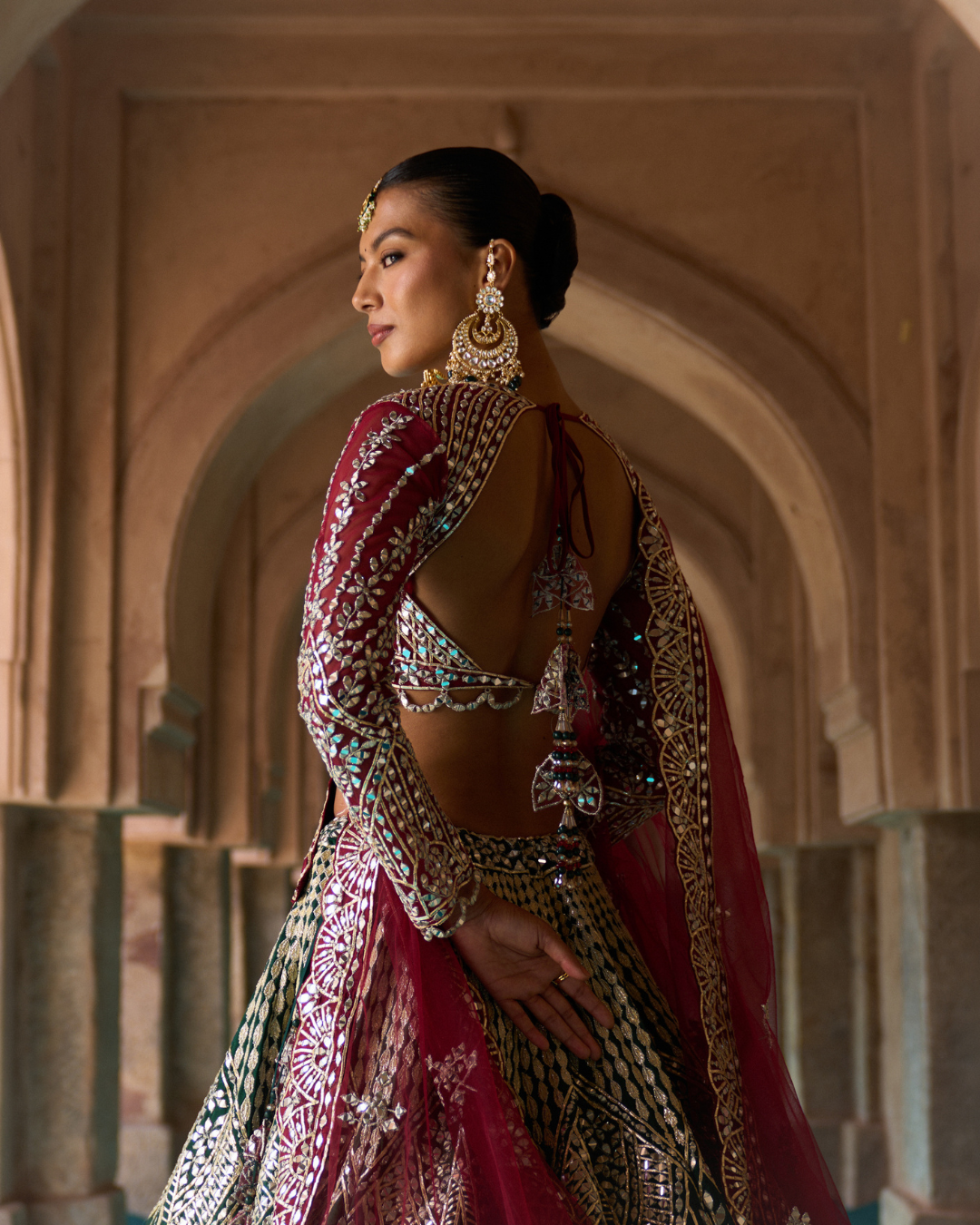 Angad Singh - SUKOON — Bottle Green Raw Silk Lehenga Set with Contrast Blouse From Zariya