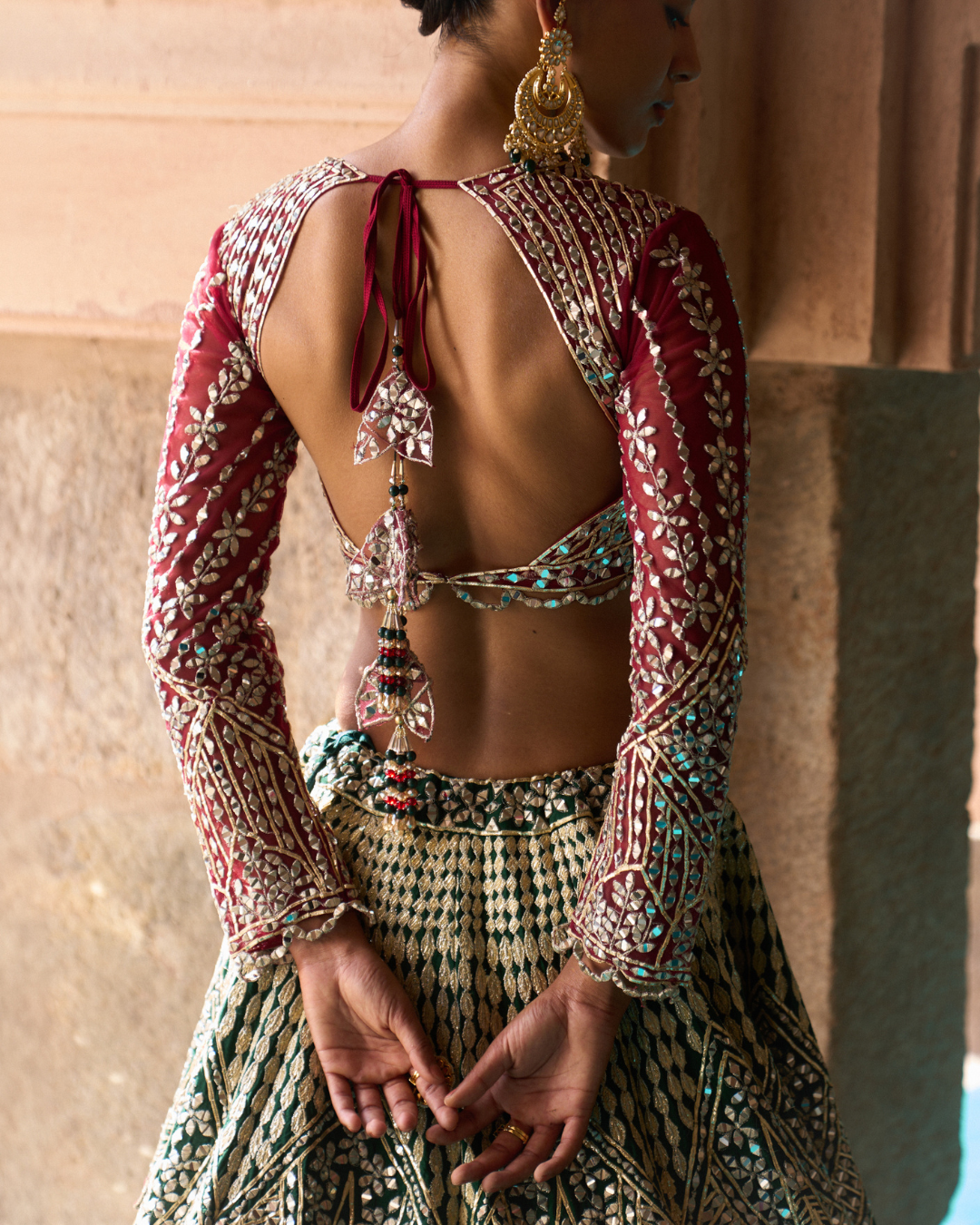 Angad Singh - SUKOON — Bottle Green Raw Silk Lehenga Set with Contrast Blouse From Zariya