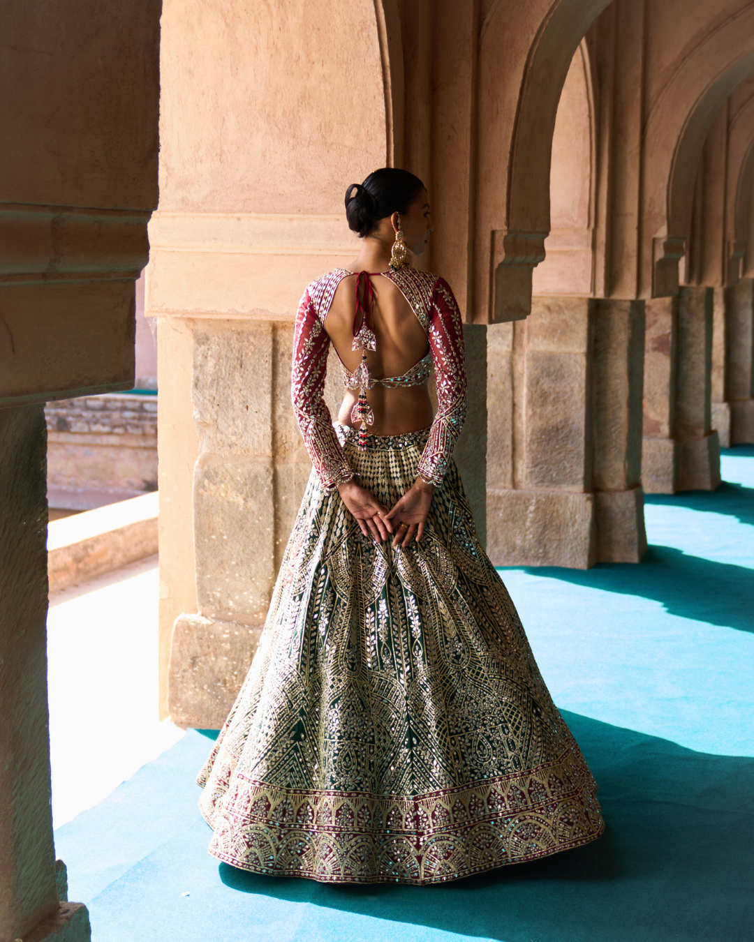 Angad Singh - SUKOON — Bottle Green Raw Silk Lehenga Set with Contrast Blouse From Zariya