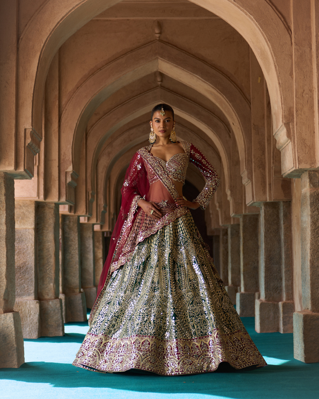 Angad Singh - SUKOON — Bottle Green Raw Silk Lehenga Set with Contrast Blouse From Zariya