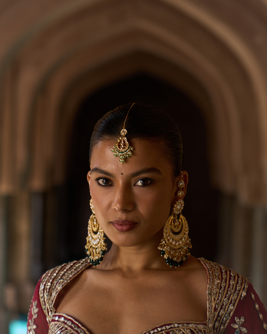 Angad Singh - SUKOON — Bottle Green Raw Silk Lehenga Set with Contrast Blouse From Zariya