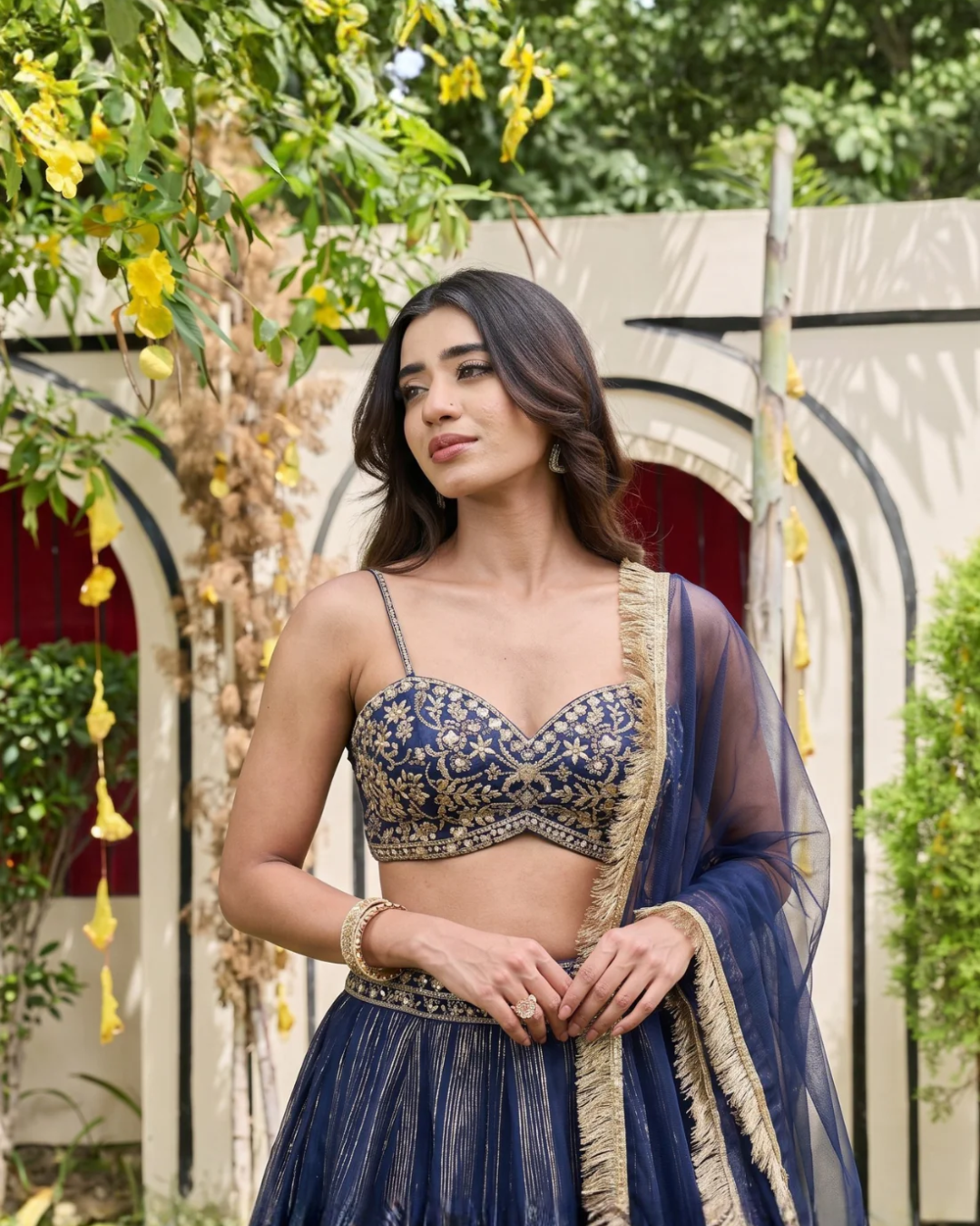 Deepika Chadha - Navy blue bustier and shimmer organza lehnga set From Heer