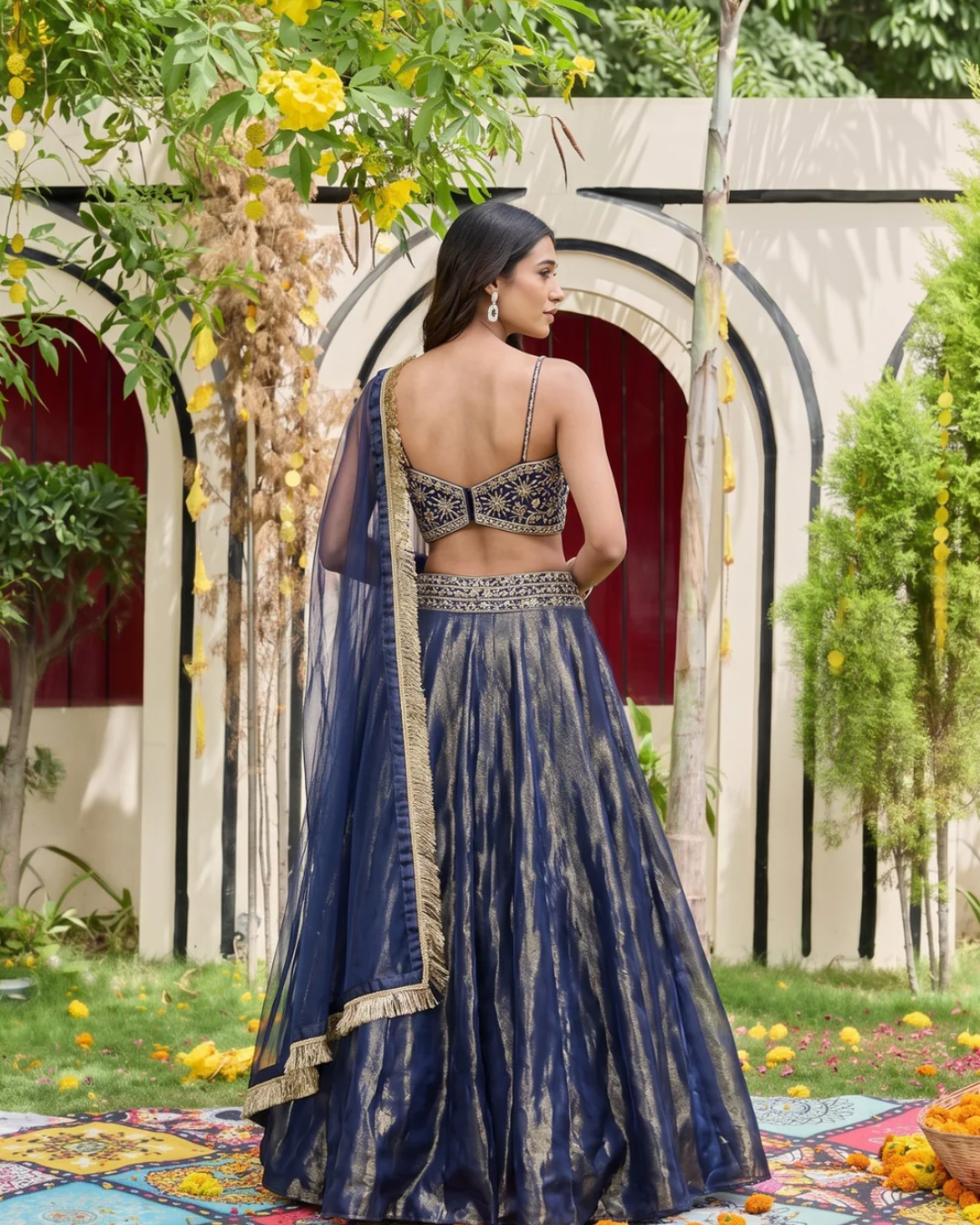 Deepika Chadha - Navy blue bustier and shimmer organza lehnga set From Heer