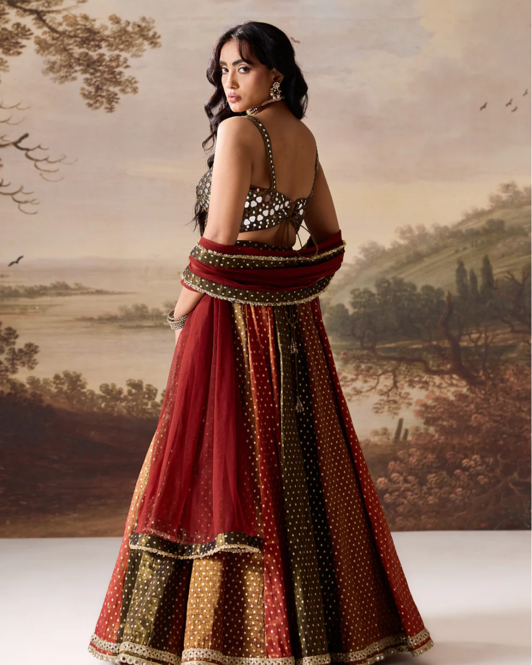 Deepika Chadha - Olive green emb blouse and cosmos multipanel lehnga set From Heer