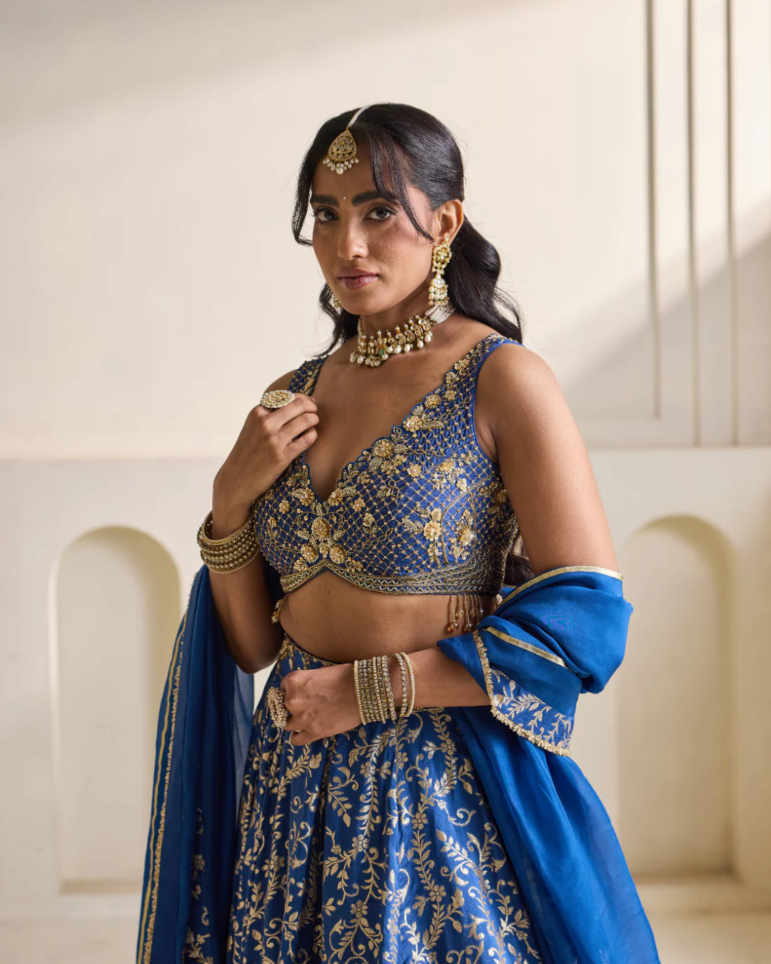 Deepika Chadha - Deep blue emb blouse and Brocade lehnga set From Heer