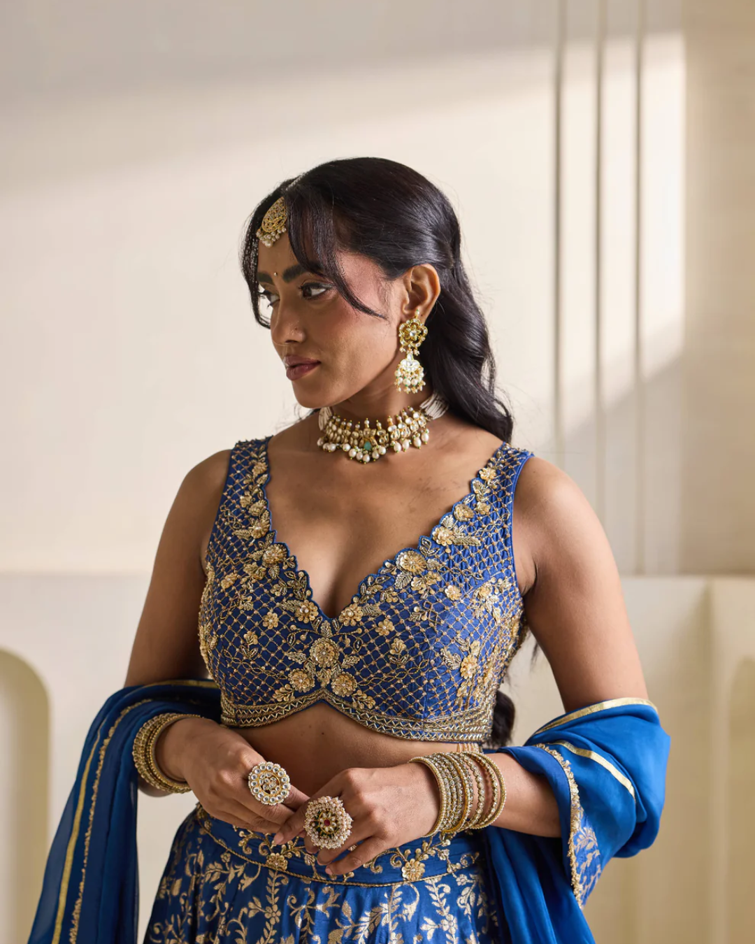Deepika Chadha - Deep blue emb blouse and Brocade lehnga set From Heer