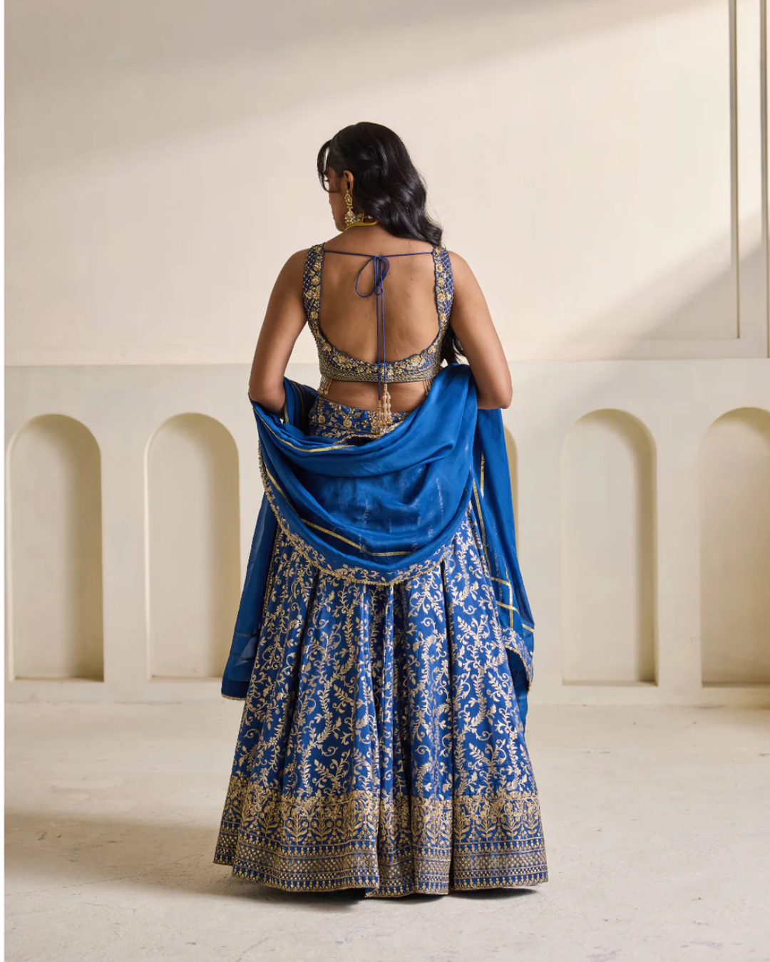 Deepika Chadha - Deep blue emb blouse and Brocade lehnga set From Heer